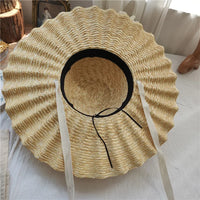 Chapeau de Paille Femme – Bord Large Ondulé avec Cordons